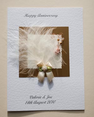 Anniversary - Feathers and bows