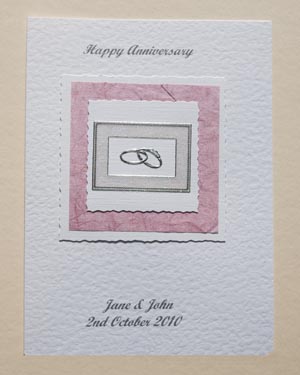 Anniversary - rings on old rose